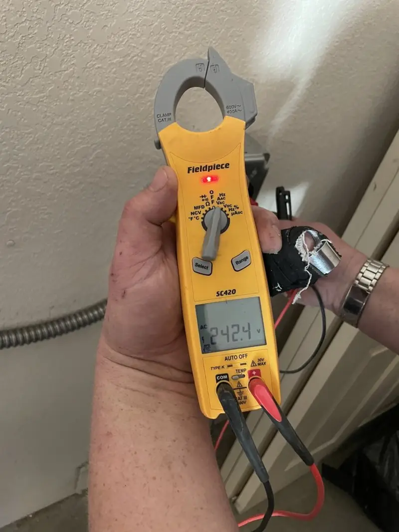 Voltage testing with clamp meter during Circuit Breaker Repair in Stillwater